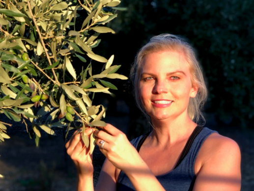 Jessica holding an olive branch